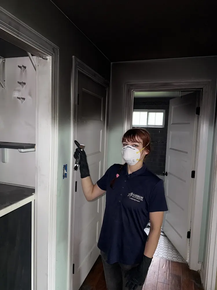 Acadiana Water & Flood Restoration technician on a job in Lafayette